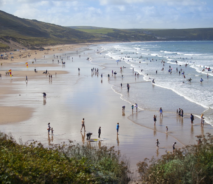 People enjoying the surfing beach of Woolacombe
